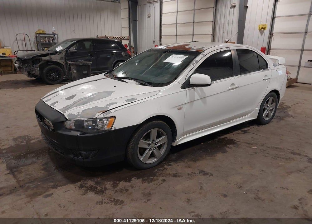 2009 MITSUBISHI LANCER VIN: JA3AU26UX9U006603
