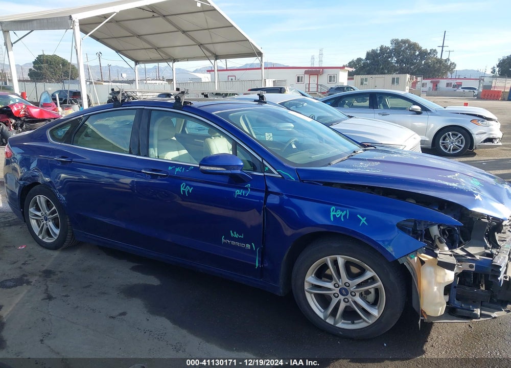 2015 FORD FUSION HYBRID TITANIUM VIN: 3FA6P0RU4FR245202