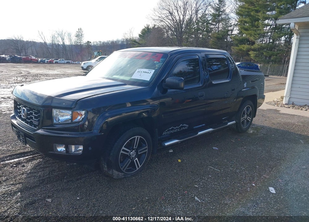 2012 HONDA RIDGELINE SPORT VIN: 5FPYK1F77CB456985