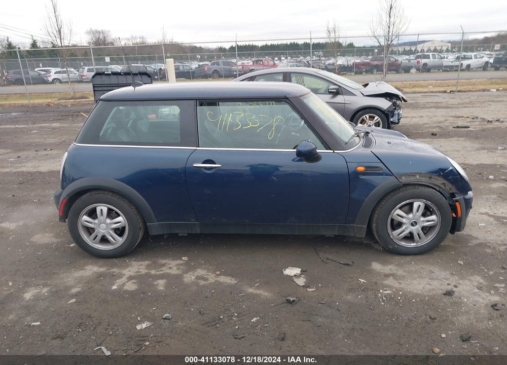 2006 MINI COOPER VIN: WMWRC33516TJ76406