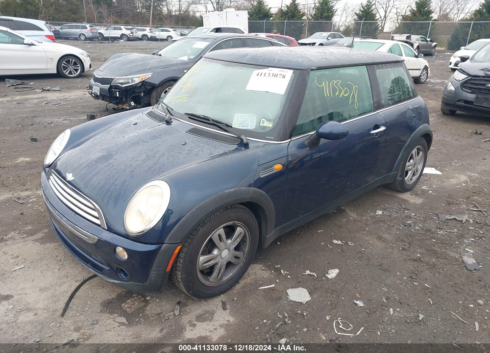 2006 MINI COOPER VIN: WMWRC33516TJ76406
