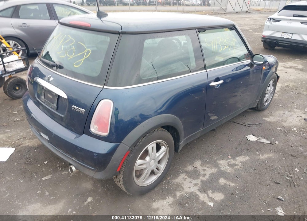 2006 MINI COOPER VIN: WMWRC33516TJ76406
