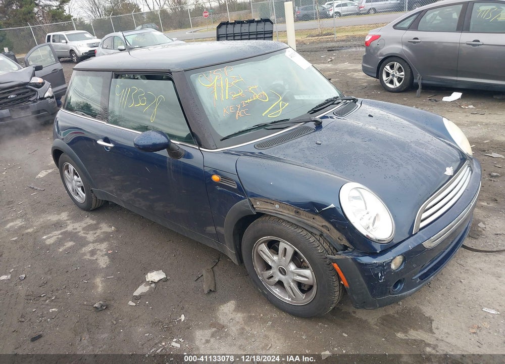2006 MINI COOPER VIN: WMWRC33516TJ76406