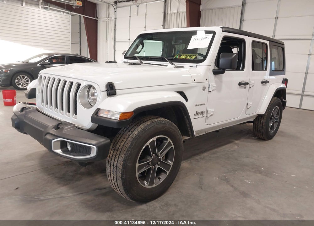 2023 JEEP WRANGLER 4-DOOR SAHARA 4X4 VIN: 1C4HJXEN9PW695020