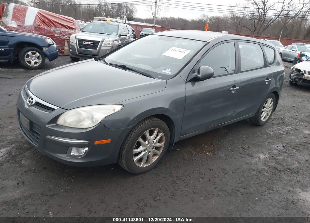 2009 HYUNDAI ELANTRA TOURING VIN: KMHDC86E09U032815