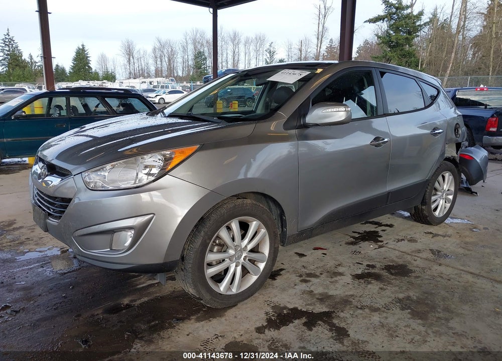 2010 HYUNDAI TUCSON LIMITED VIN: KM8JUCAC6AU052094
