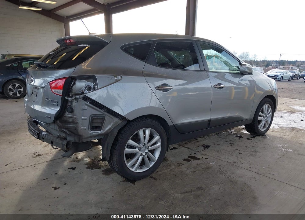 2010 HYUNDAI TUCSON LIMITED VIN: KM8JUCAC6AU052094