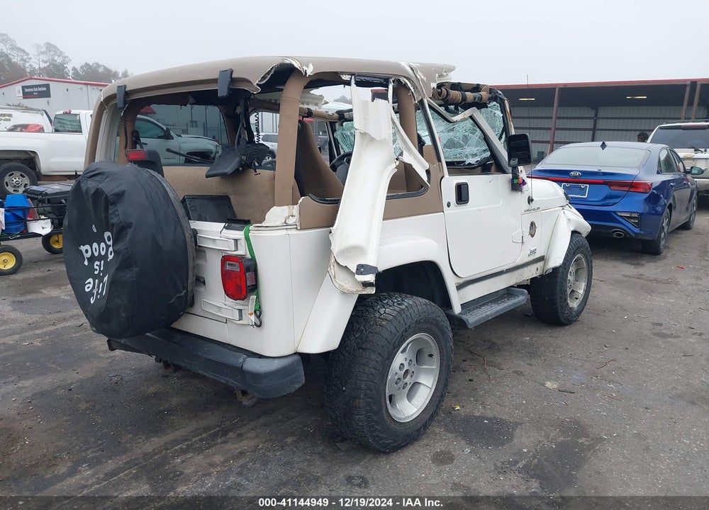 2002 JEEP WRANGLER SAHARA VIN: 1J4FA59S02P714577