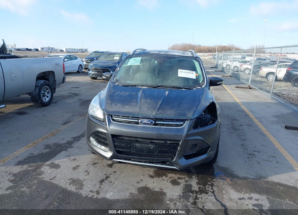 2016 FORD ESCAPE TITANIUM VIN: 1FMCU9J94GUC42615