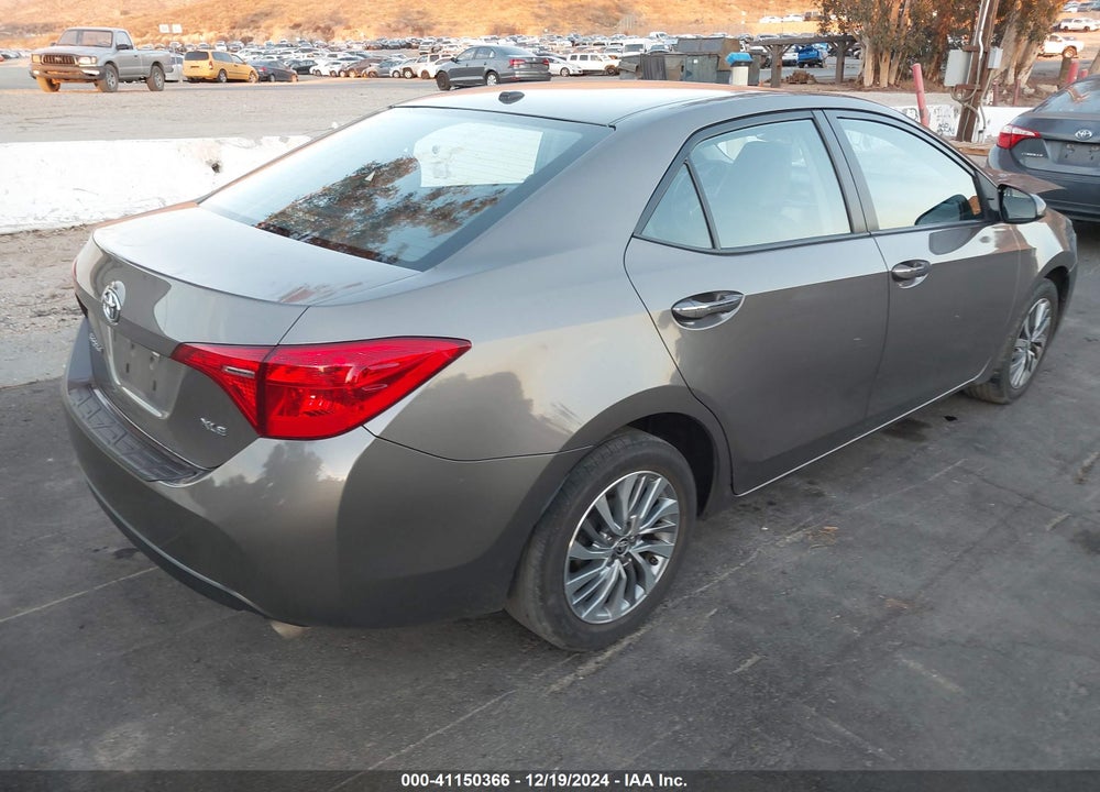 2018 TOYOTA COROLLA XLE VIN: 5YFBURHE8JP767796