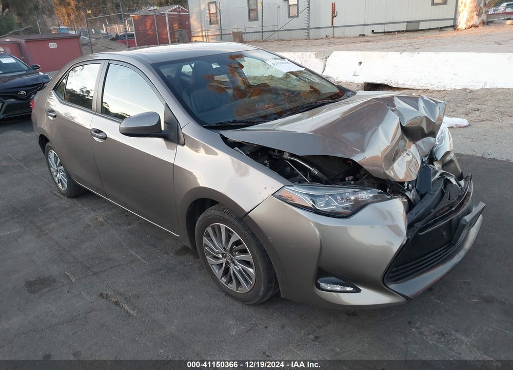 2018 TOYOTA COROLLA XLE VIN: 5YFBURHE8JP767796