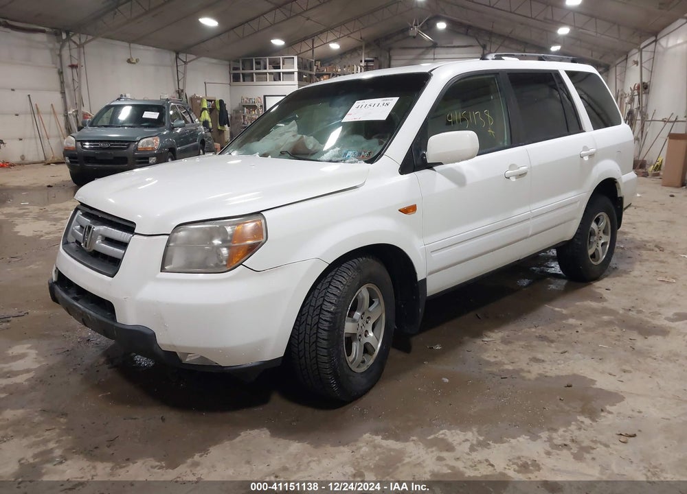 2007 HONDA PILOT EX-L VIN: 5FNYF18717B031357