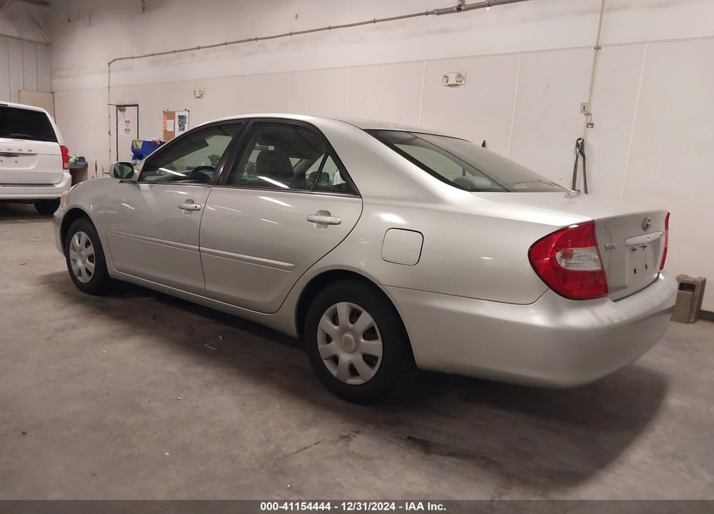 2003 TOYOTA CAMRY LE VIN: JTDBE32K830220288