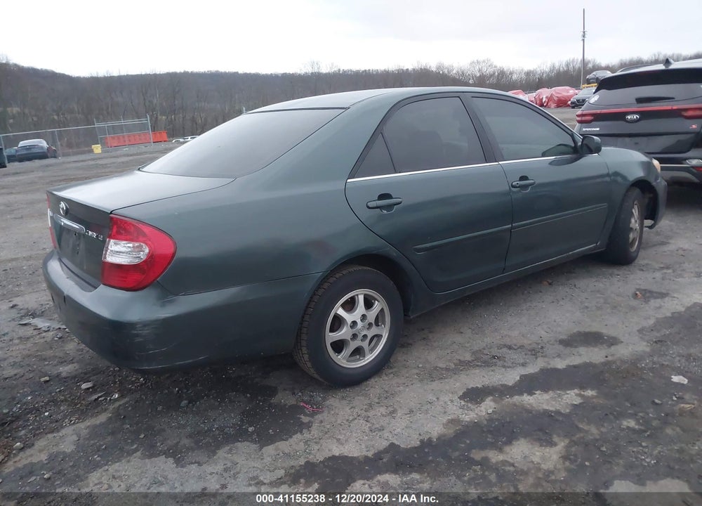 2003 TOYOTA CAMRY LE VIN: JTDBE32K530161734