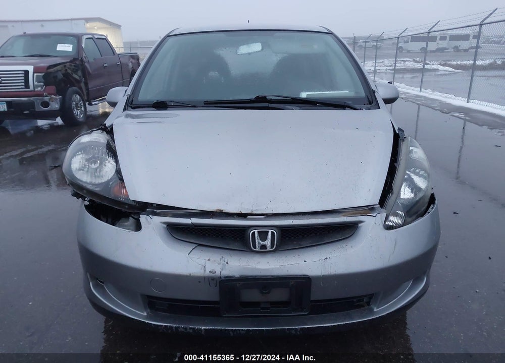 2007 HONDA FIT VIN: JHMGD38497S021180