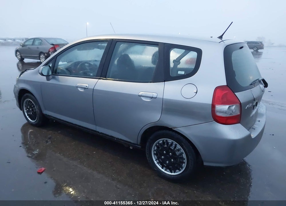 2007 HONDA FIT VIN: JHMGD38497S021180