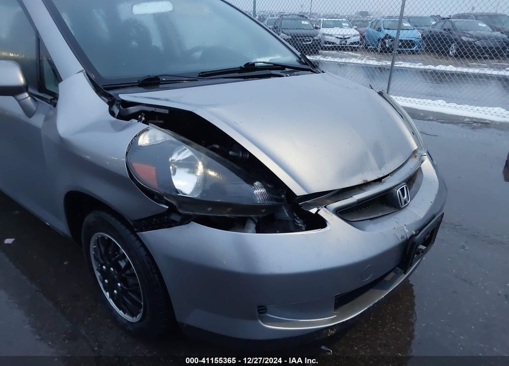 2007 HONDA FIT VIN: JHMGD38497S021180