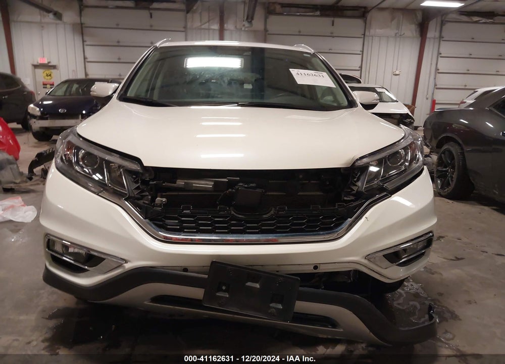 2016 HONDA CR-V TOURING VIN: 5J6RM4H93GL124384