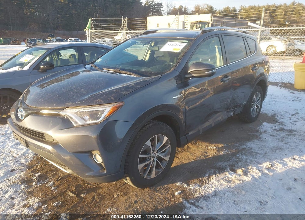 2016 TOYOTA RAV4 HYBRID XLE VIN: JTMRJREV7GD048935