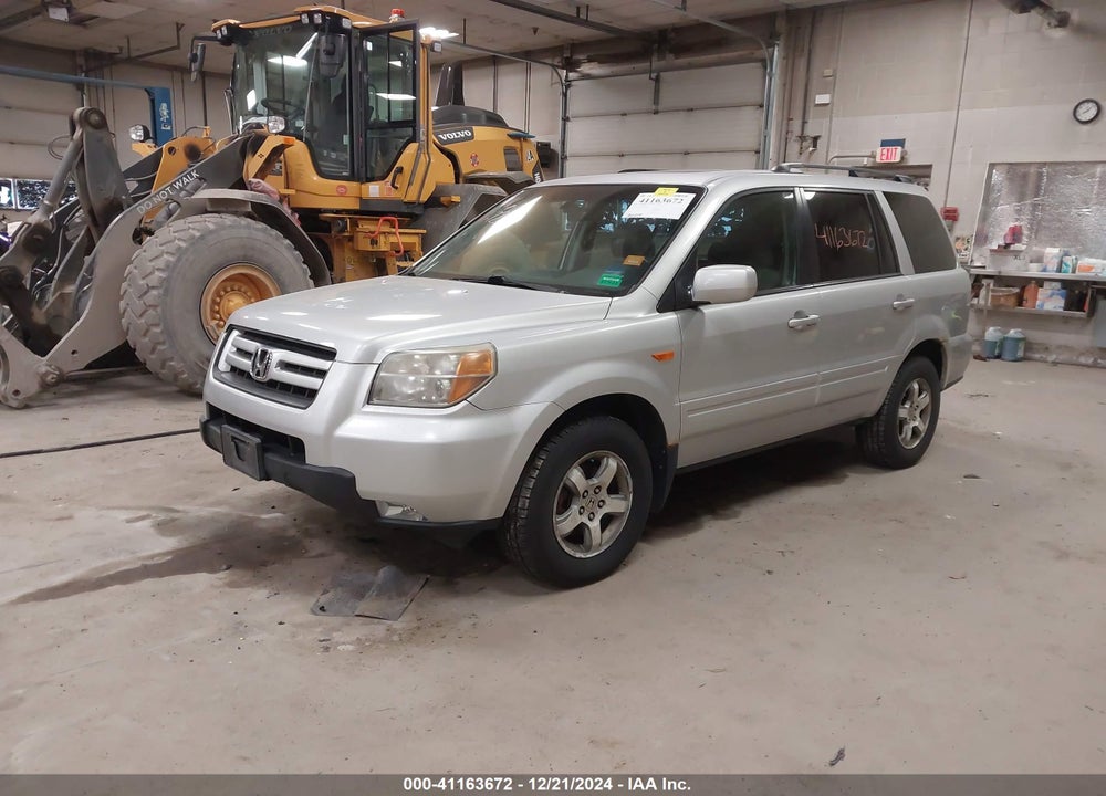 2007 HONDA PILOT EX-L VIN: 2HKYF18517H539246
