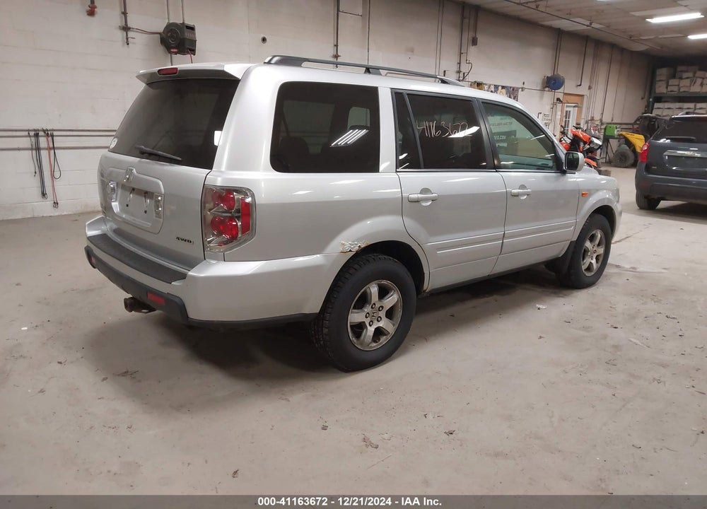 2007 HONDA PILOT EX-L VIN: 2HKYF18517H539246