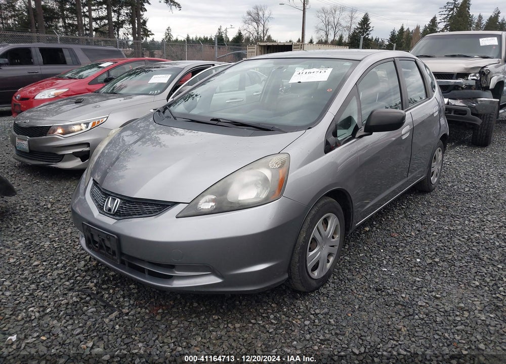 2009 HONDA FIT VIN: JHMGE88279S027829
