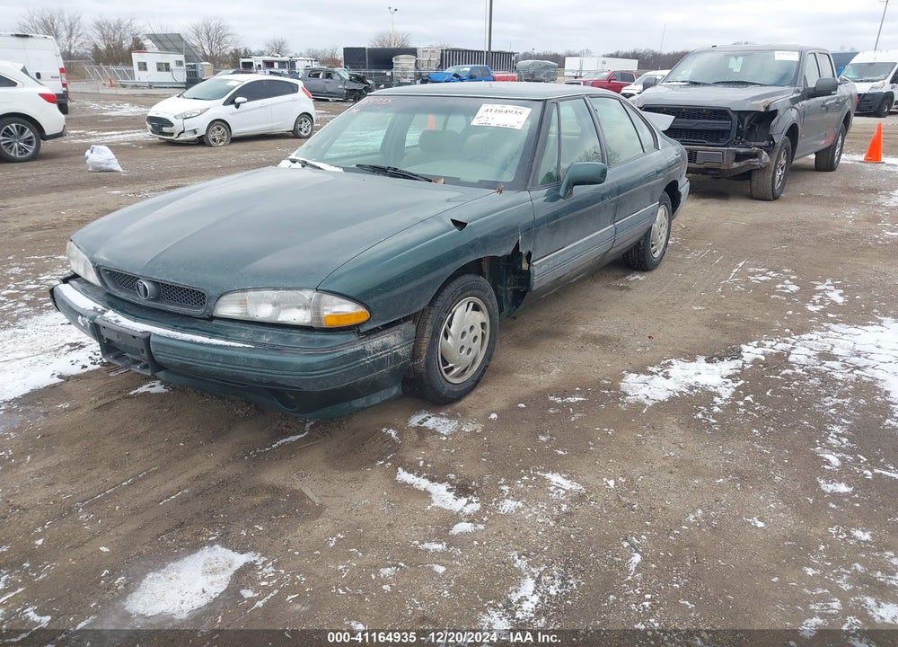 1994 PONTIAC BONNEVILLE SE VIN: 1G2HX52L1R4243605