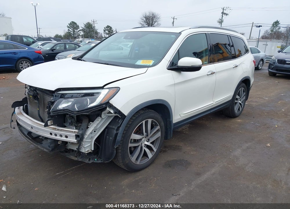 2017 HONDA PILOT TOURING VIN: 5FNYF5H91HB047200