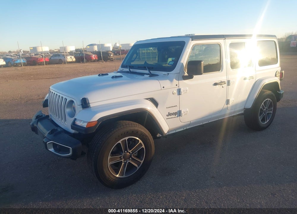 2023 JEEP WRANGLER 4-DOOR SAHARA 4X4 VIN: 1C4HJXEN9PW695177
