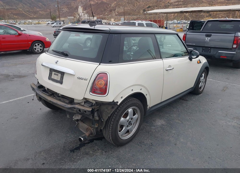 2010 MINI COOPER VIN: WMWMF3C54ATZ66213