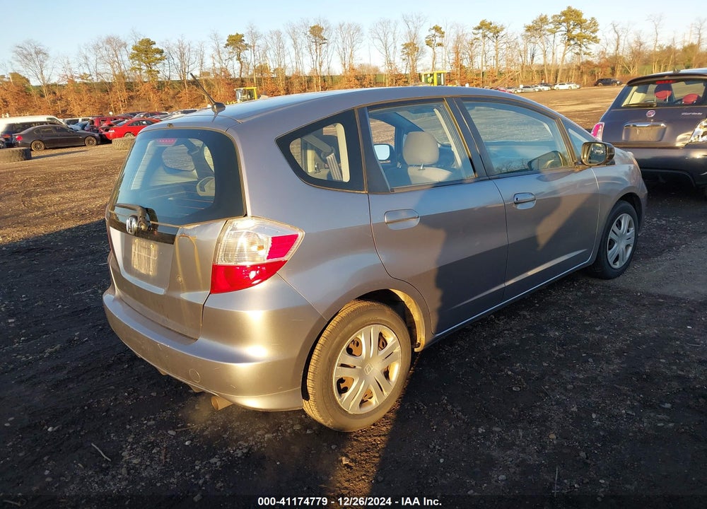 2010 HONDA FIT VIN: JHMGE8H23AS011518