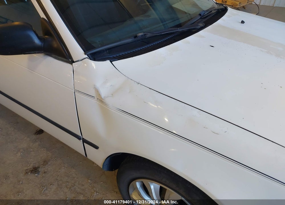 1997 TOYOTA COROLLA STD VIN: 1NXBA02E4VZ612843