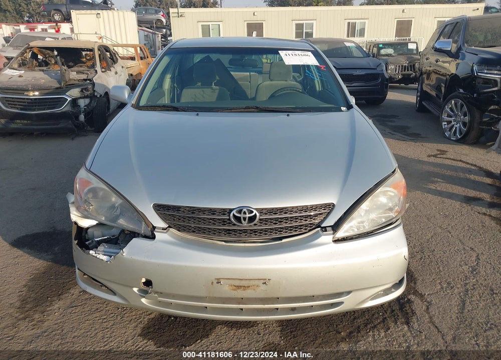 2003 TOYOTA CAMRY LE VIN: JTDBE32KX30244737