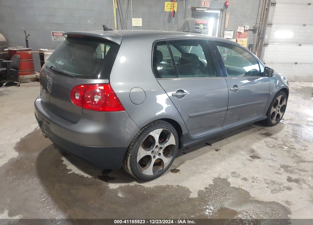 2009 VOLKSWAGEN GTI VIN: WVWHD71K59W140023