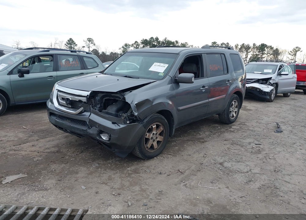 2011 HONDA PILOT TOURING VIN: 5FNYF4H97BB007673