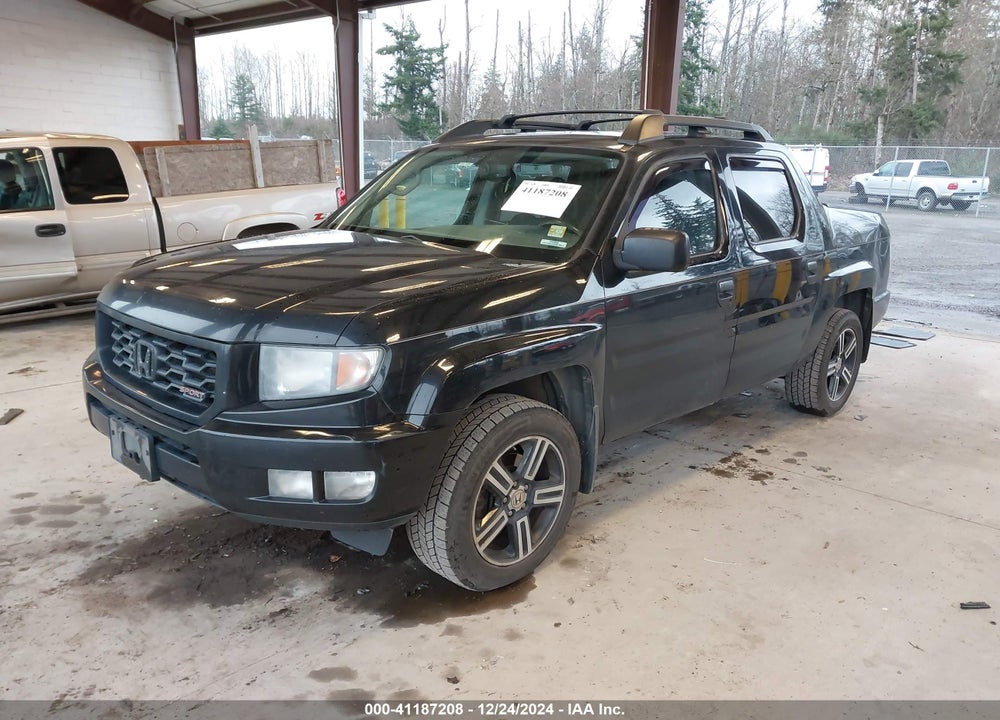 2014 HONDA RIDGELINE SPORT VIN: 5FPYK1F71EB013461