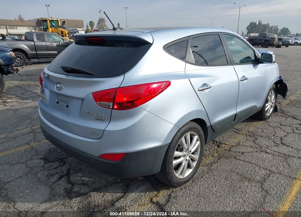 2012 HYUNDAI TUCSON LIMITED VIN: KM8JUCAC7CU535192