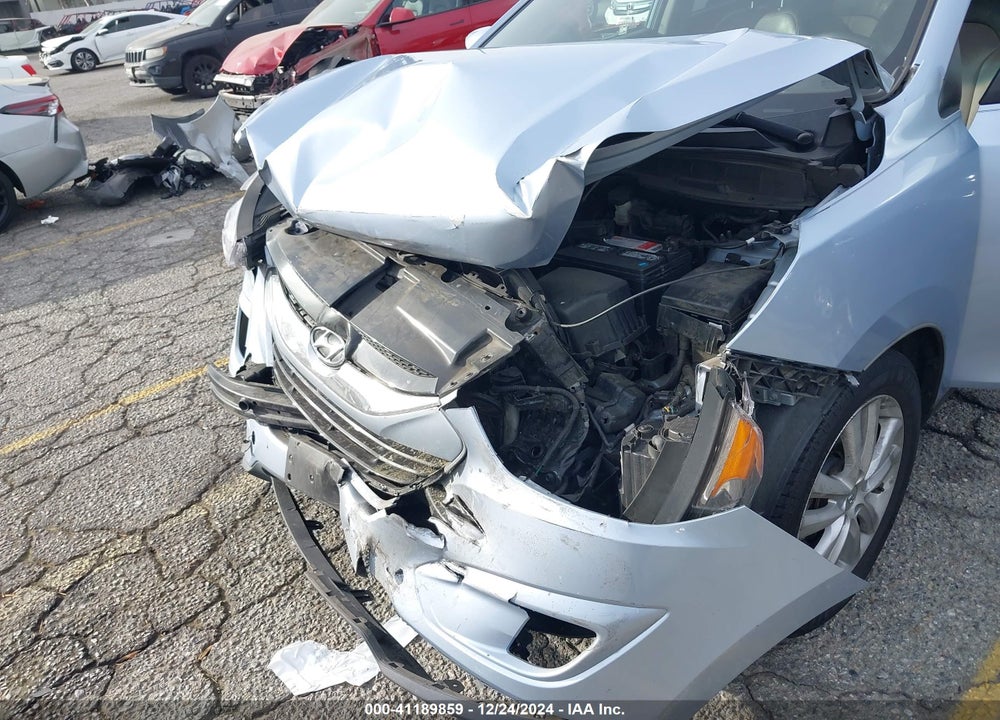 2012 HYUNDAI TUCSON LIMITED VIN: KM8JUCAC7CU535192