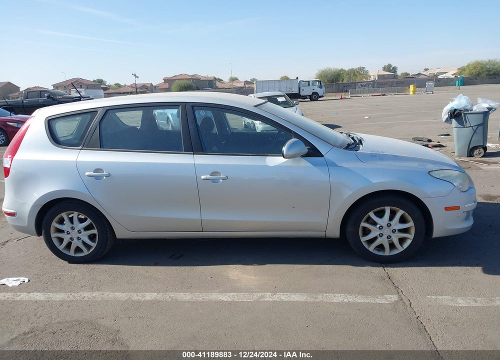 2009 HYUNDAI ELANTRA TOURING VIN: KMHDC86E39U046174