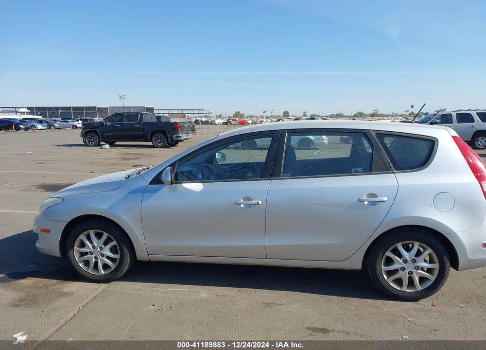 2009 HYUNDAI ELANTRA TOURING VIN: KMHDC86E39U046174