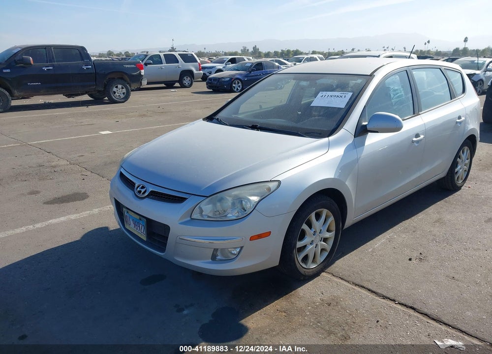 2009 HYUNDAI ELANTRA TOURING VIN: KMHDC86E39U046174