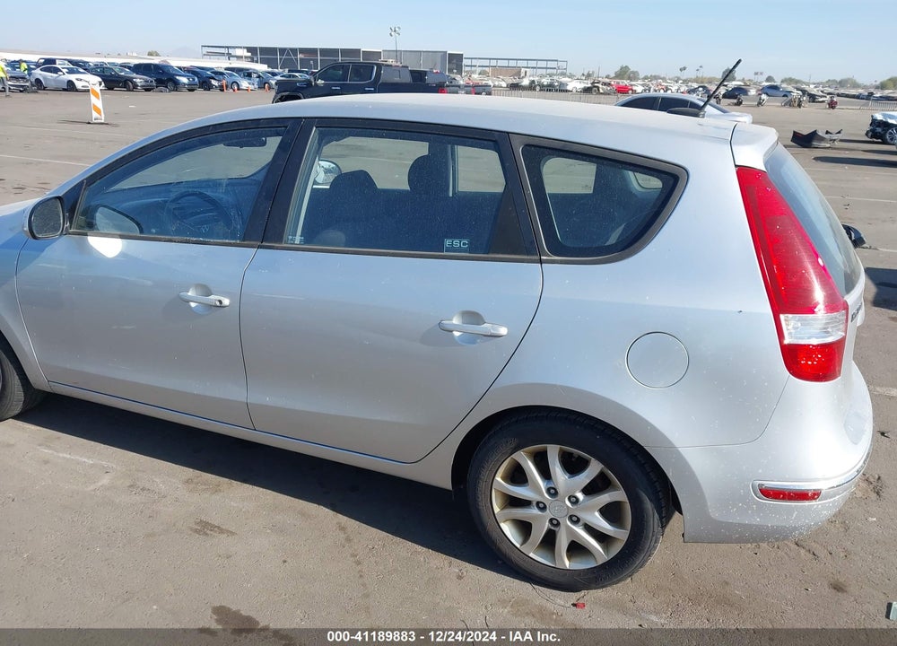 2009 HYUNDAI ELANTRA TOURING VIN: KMHDC86E39U046174