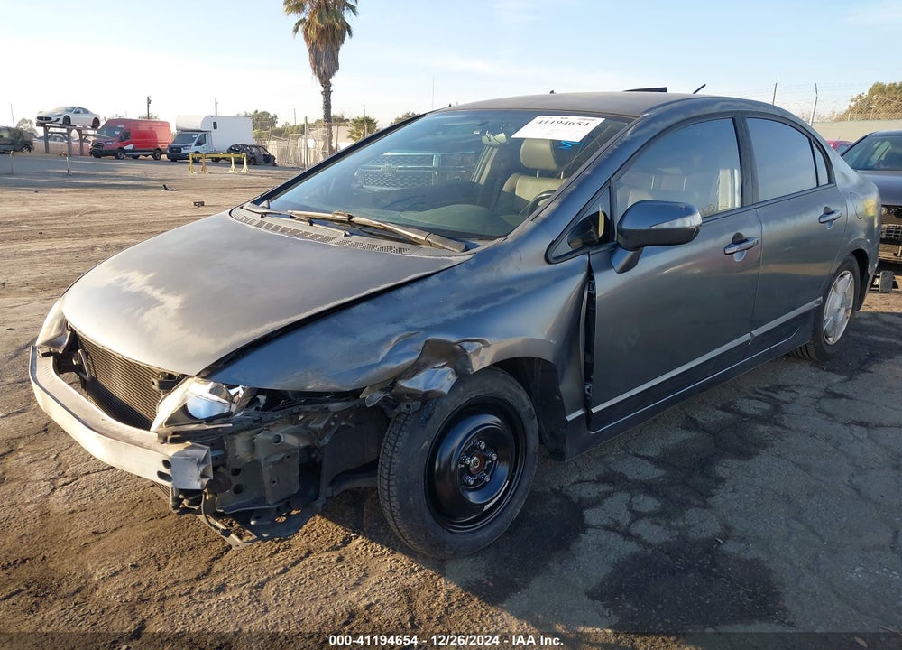 2010 HONDA CIVIC HYBRID VIN: JHMFA3F28AS005520