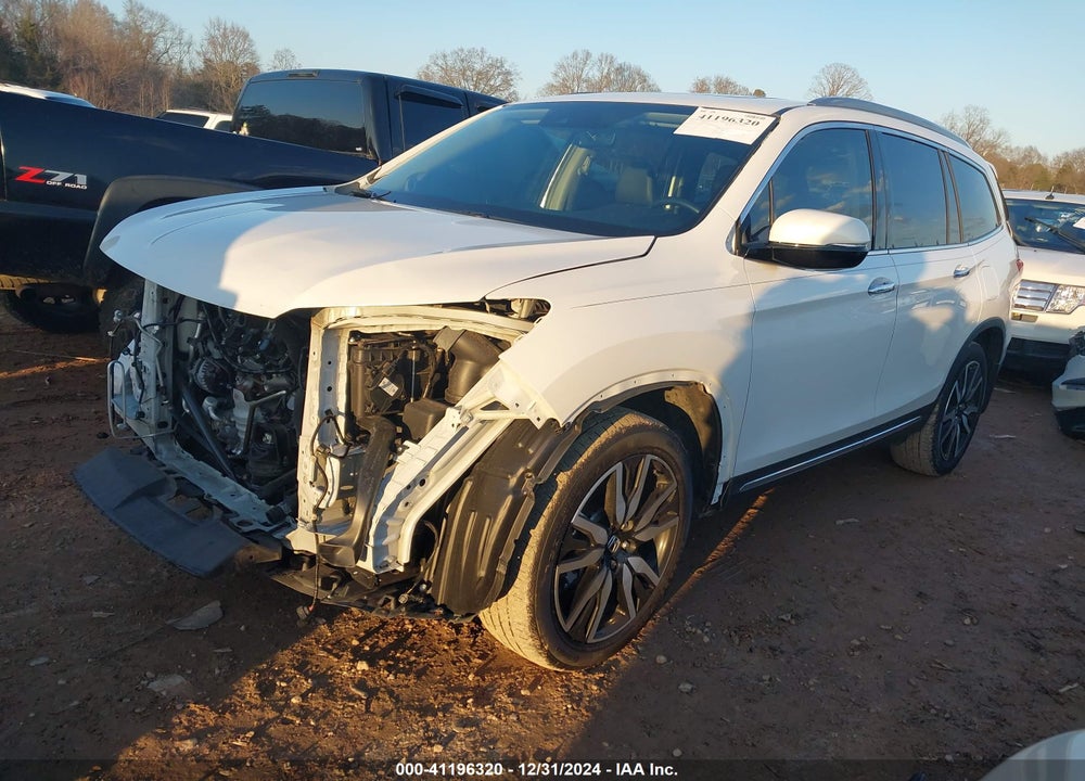 2021 HONDA PILOT 2WD TOURING 7 PASSENGER VIN: 5FNYF5H65MB025717