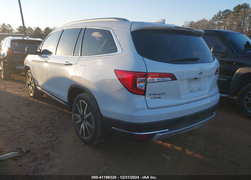 2021 HONDA PILOT 2WD TOURING 7 PASSENGER VIN: 5FNYF5H65MB025717