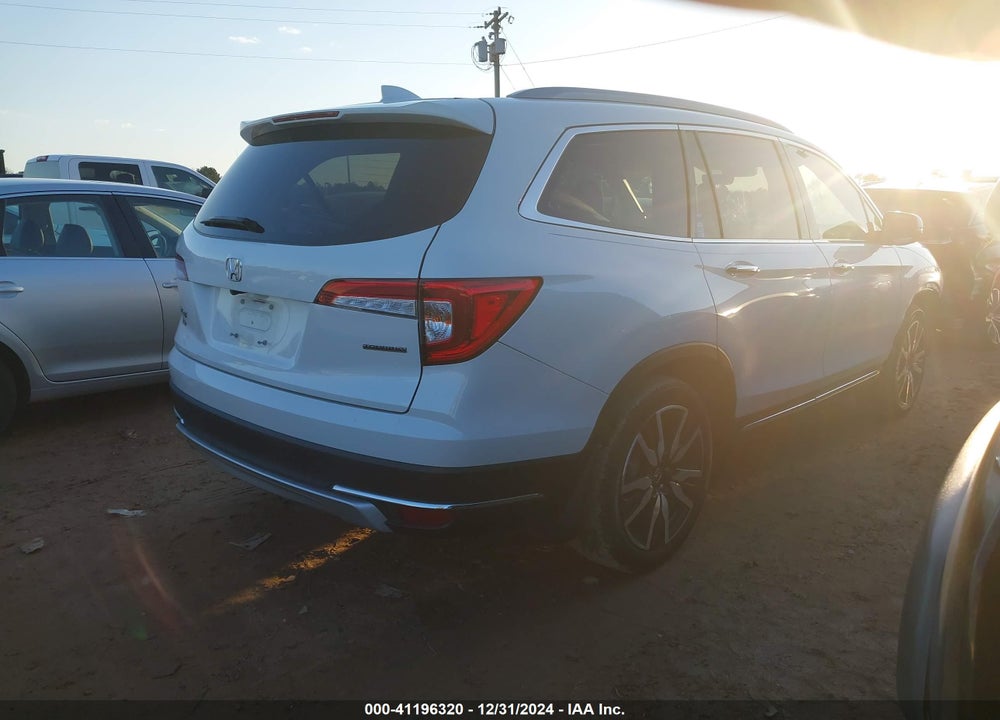 2021 HONDA PILOT 2WD TOURING 7 PASSENGER VIN: 5FNYF5H65MB025717
