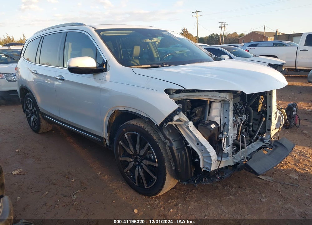 2021 HONDA PILOT 2WD TOURING 7 PASSENGER VIN: 5FNYF5H65MB025717