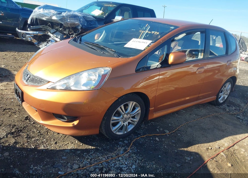 2009 HONDA FIT VIN: JHMGE88469S030691