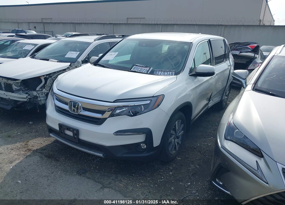 2022 HONDA PILOT 2WD EX-L VIN: 5FNYF5H50NB000264