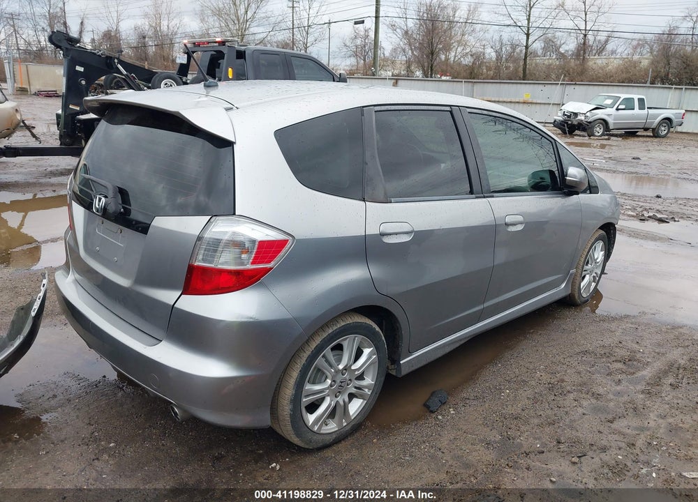 2009 HONDA FIT SPORT VIN: JHMGE88499S042740